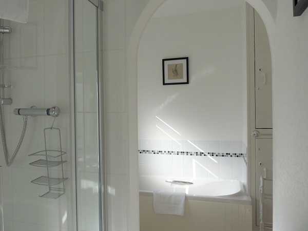 En-suite with shower, basin, WC and heated towel radiator